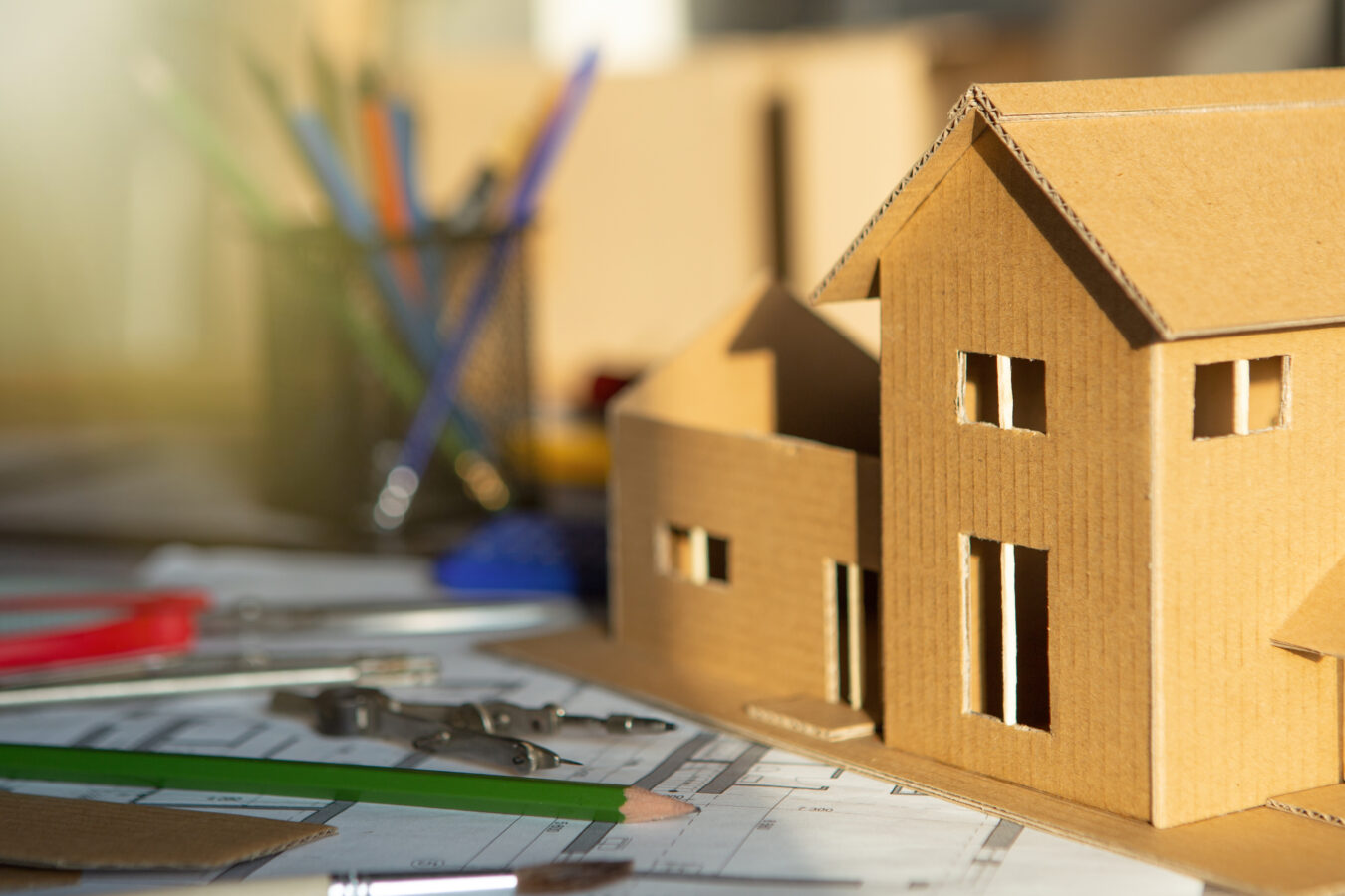 An image showing a paper house symbolizing Property Management