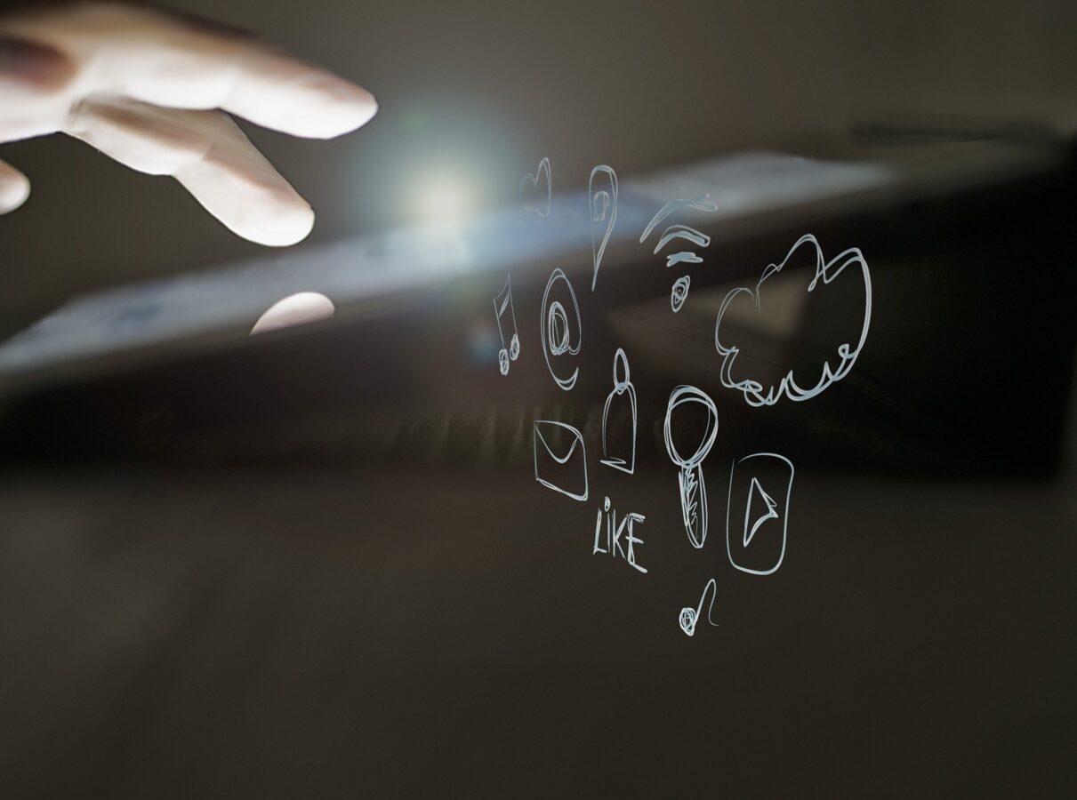 Fingers touch the screen trying to find out the role of APM in keeping apps active.