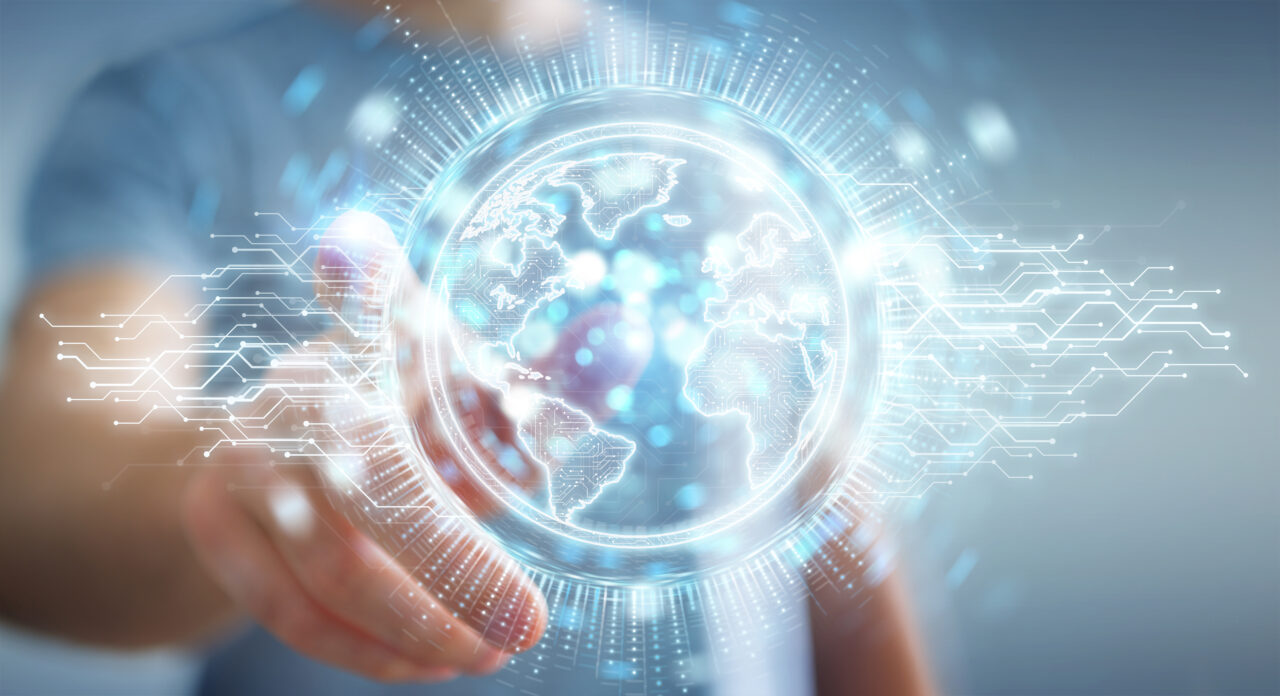 a hand touching the screen demonstrating AI-powered technology