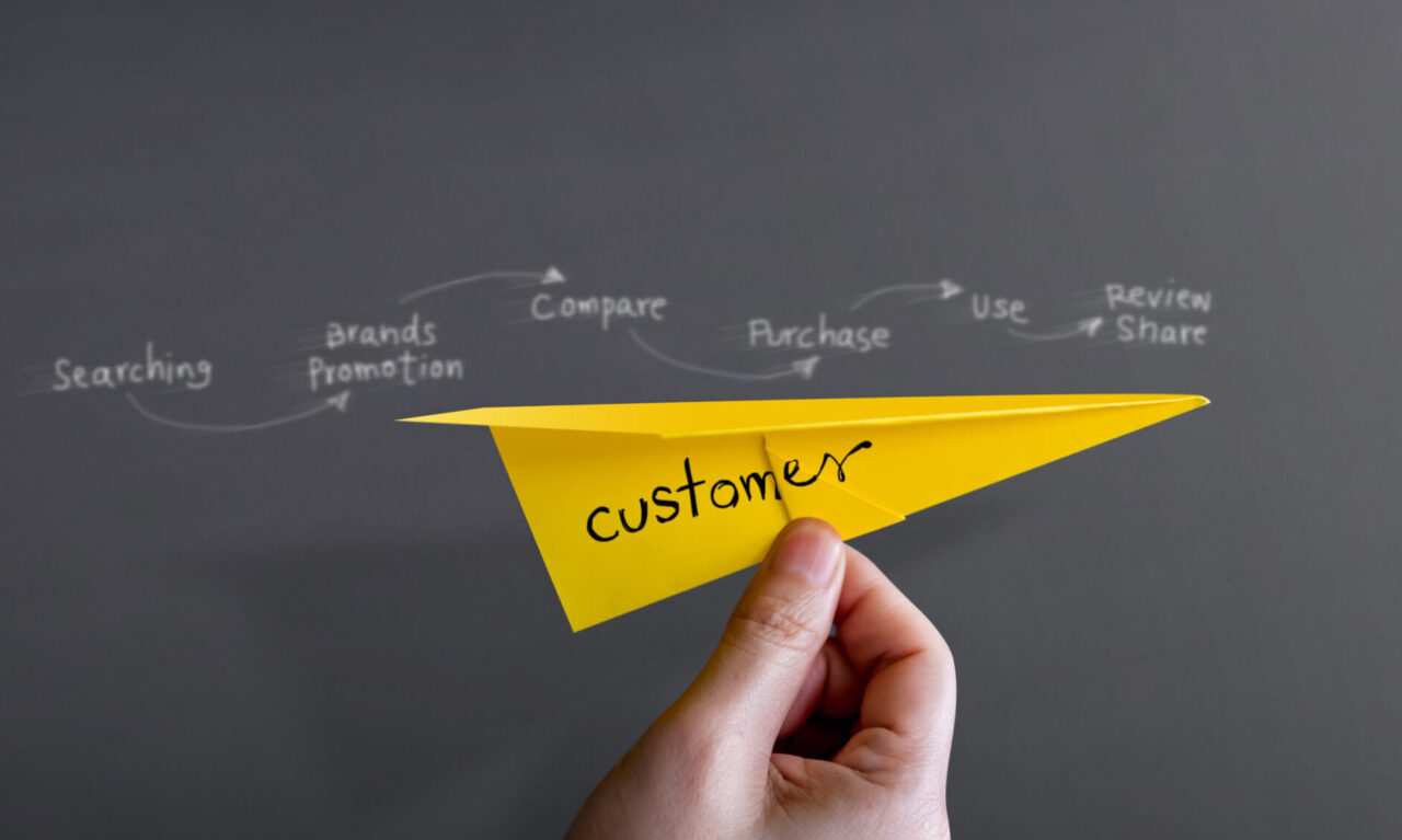 A paper plane showing the CX programme route