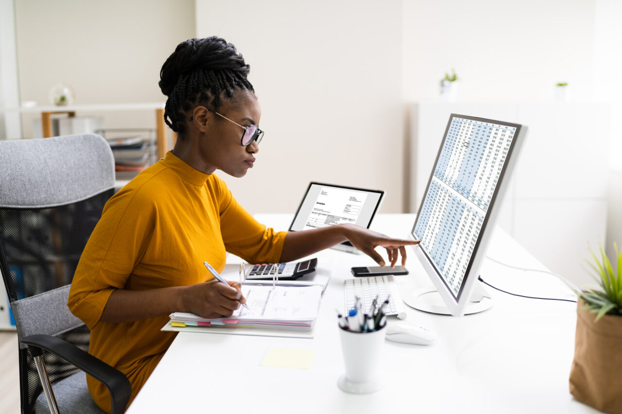 A young woman uses her computer to gather zero-party data.