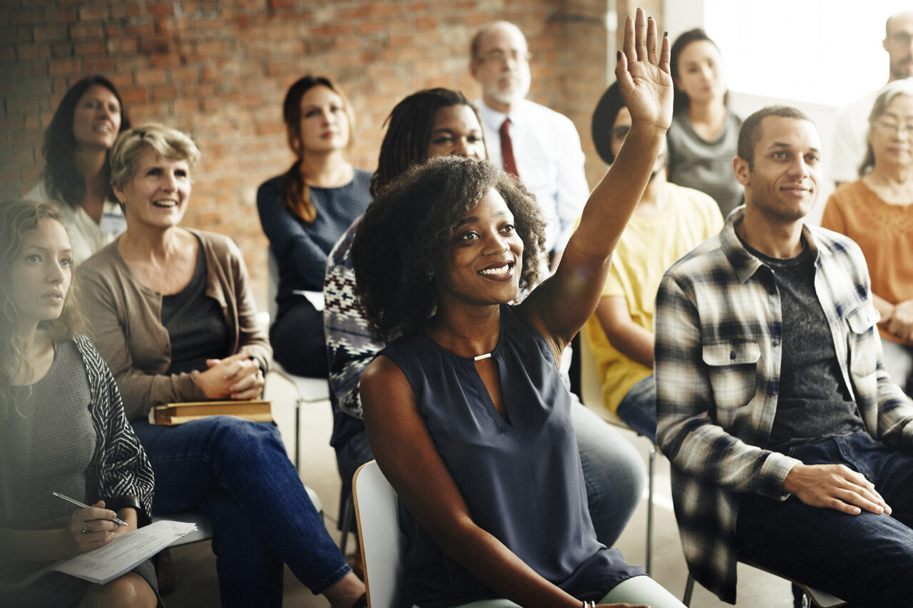 an image showing a young woman participating in the process of employee engagement and organizational change.