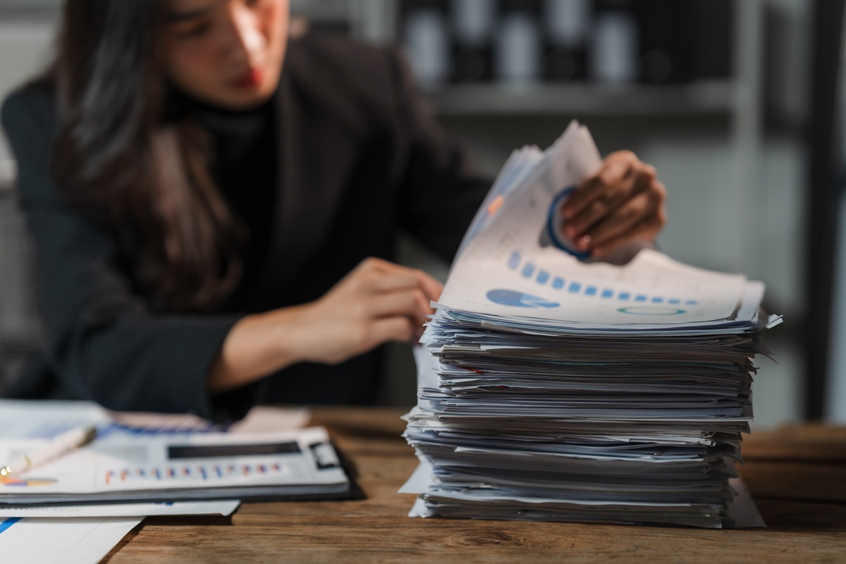 woman drowning in AI data