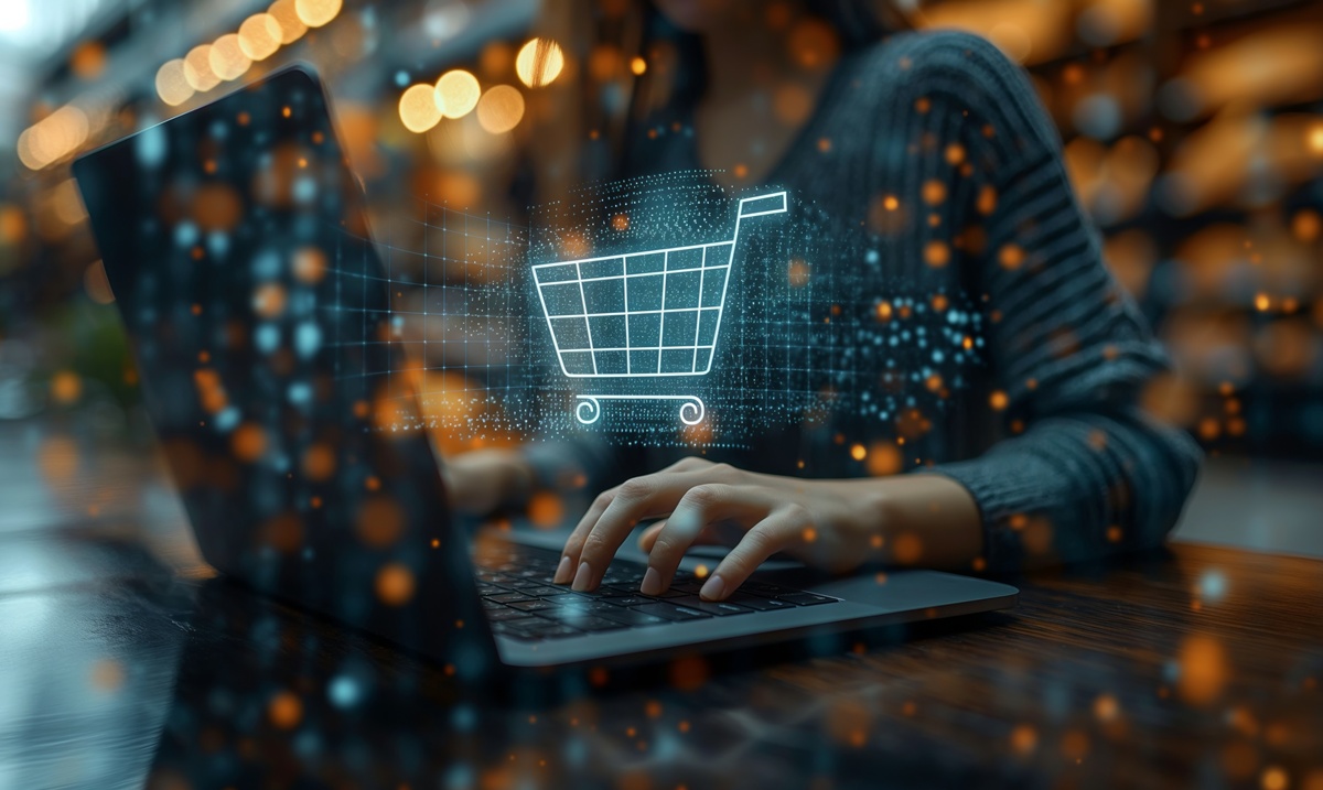 Person using laptop, showing online shopping and online marketplace.