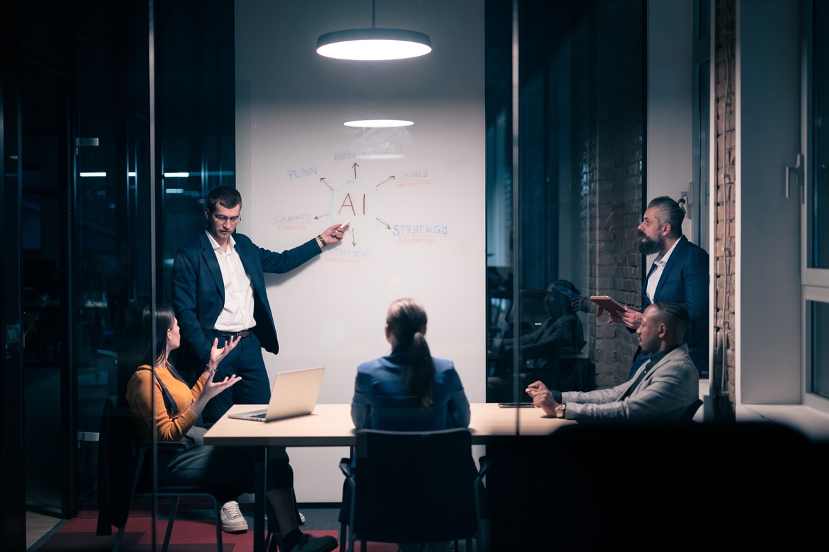 Businessmen talking about an AI strategy.